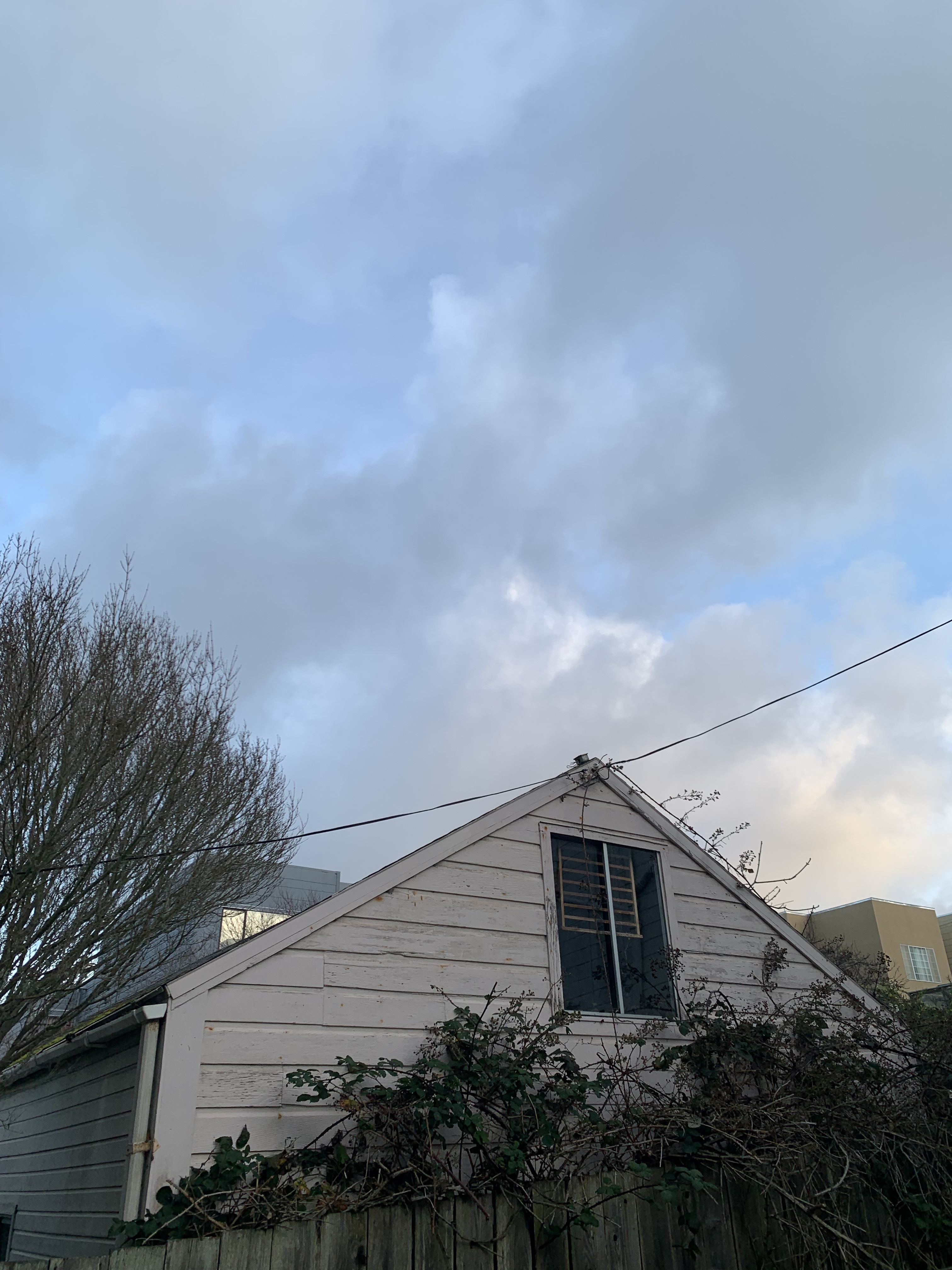 A house and clouds